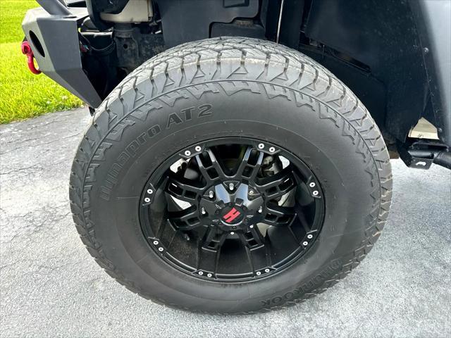 used 2018 Jeep Wrangler JK Unlimited car, priced at $24,990