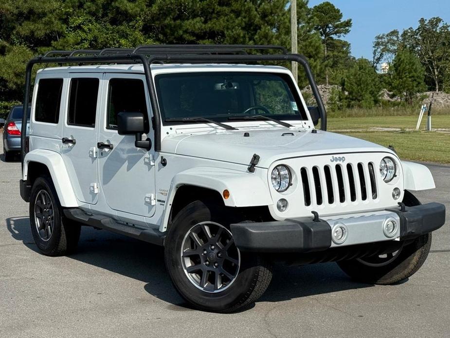 used 2015 Jeep Wrangler Unlimited car, priced at $16,699