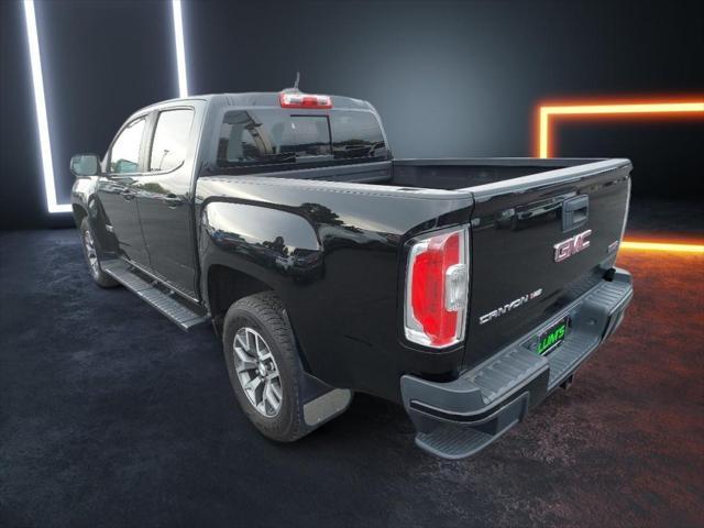 used 2018 GMC Canyon car, priced at $32,702