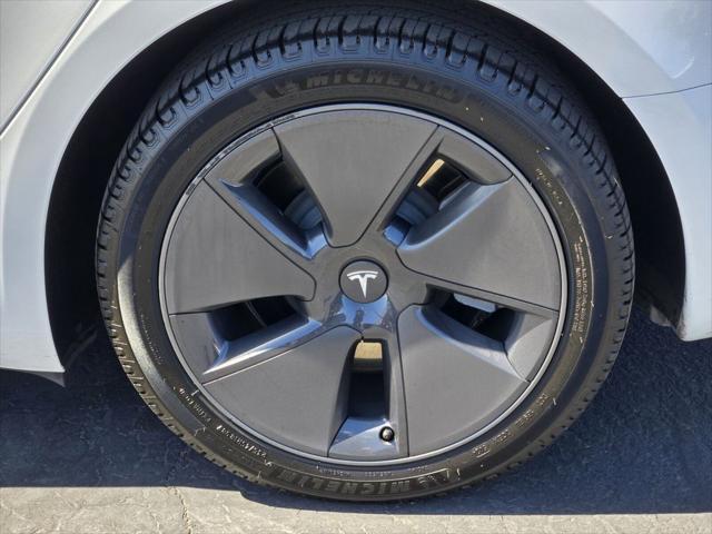 used 2023 Tesla Model 3 car, priced at $25,100