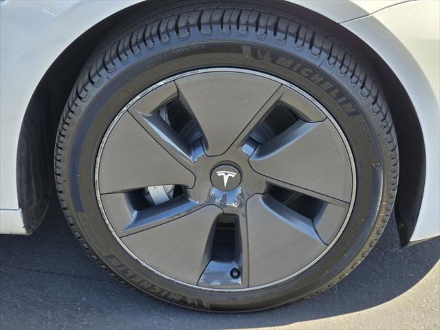 used 2023 Tesla Model 3 car, priced at $25,100