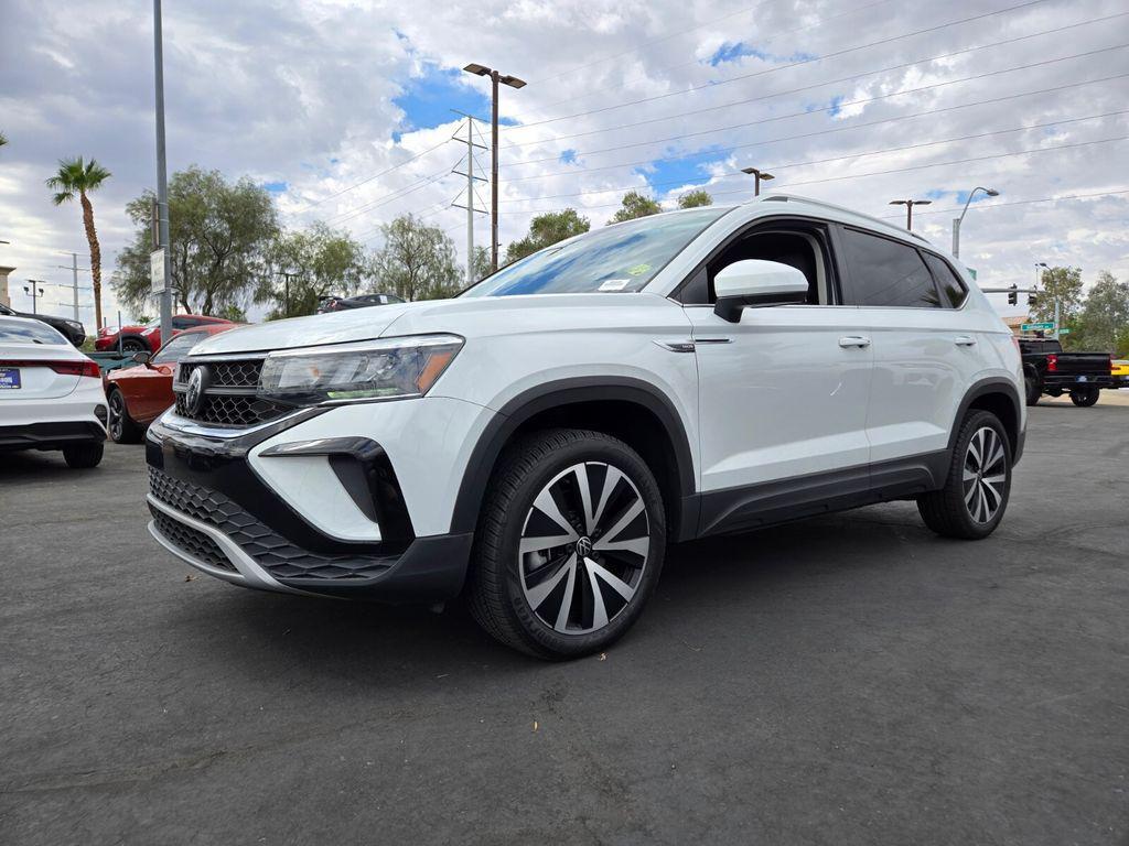 used 2023 Volkswagen Taos car, priced at $20,594