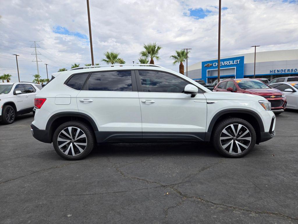 used 2023 Volkswagen Taos car, priced at $20,594