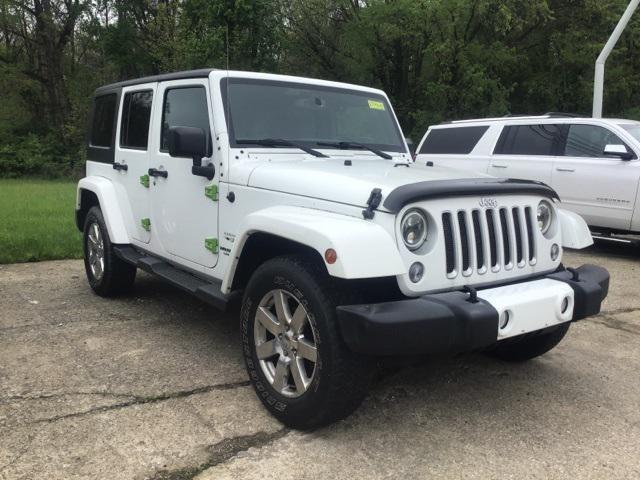 used 2016 Jeep Wrangler Unlimited car, priced at $23,691