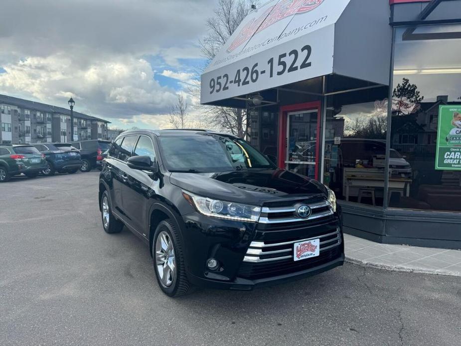 used 2019 Toyota Highlander Hybrid car, priced at $27,450