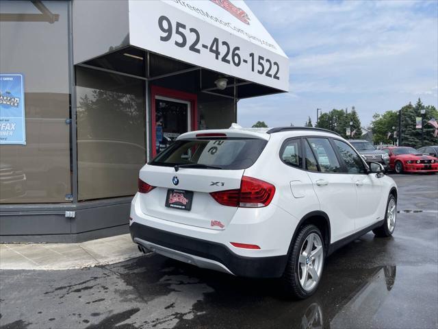 used 2015 BMW X1 car, priced at $12,495