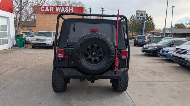 used 2011 Jeep Wrangler Unlimited car, priced at $12,995