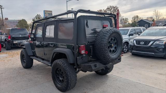 used 2011 Jeep Wrangler Unlimited car, priced at $12,995