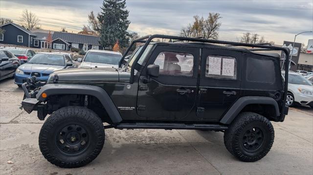 used 2011 Jeep Wrangler Unlimited car, priced at $12,995