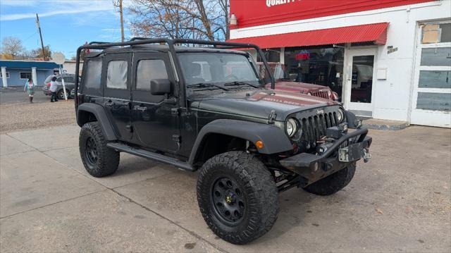 used 2011 Jeep Wrangler Unlimited car, priced at $12,995