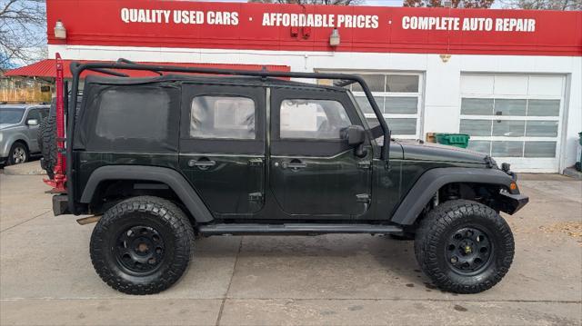 used 2011 Jeep Wrangler Unlimited car, priced at $12,995