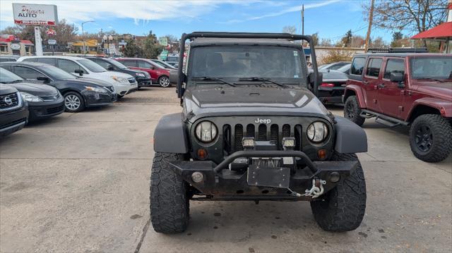 used 2011 Jeep Wrangler Unlimited car, priced at $12,995