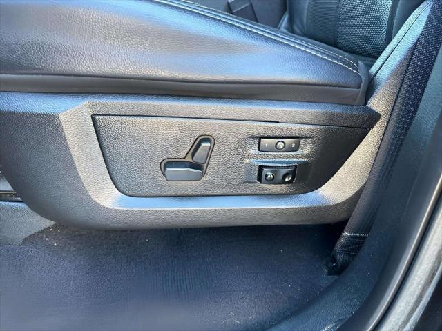 used 2018 Ram 1500 car, priced at $25,692