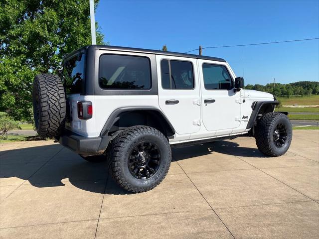 used 2021 Jeep Wrangler Unlimited car, priced at $38,280