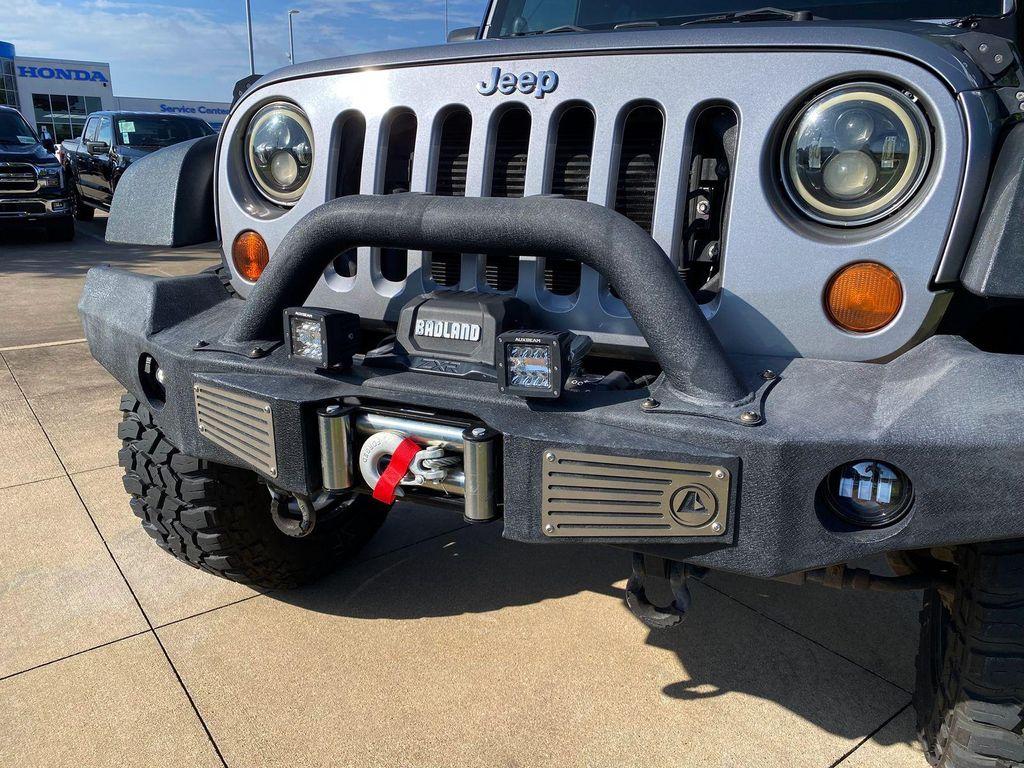 used 2013 Jeep Wrangler Unlimited car, priced at $16,890
