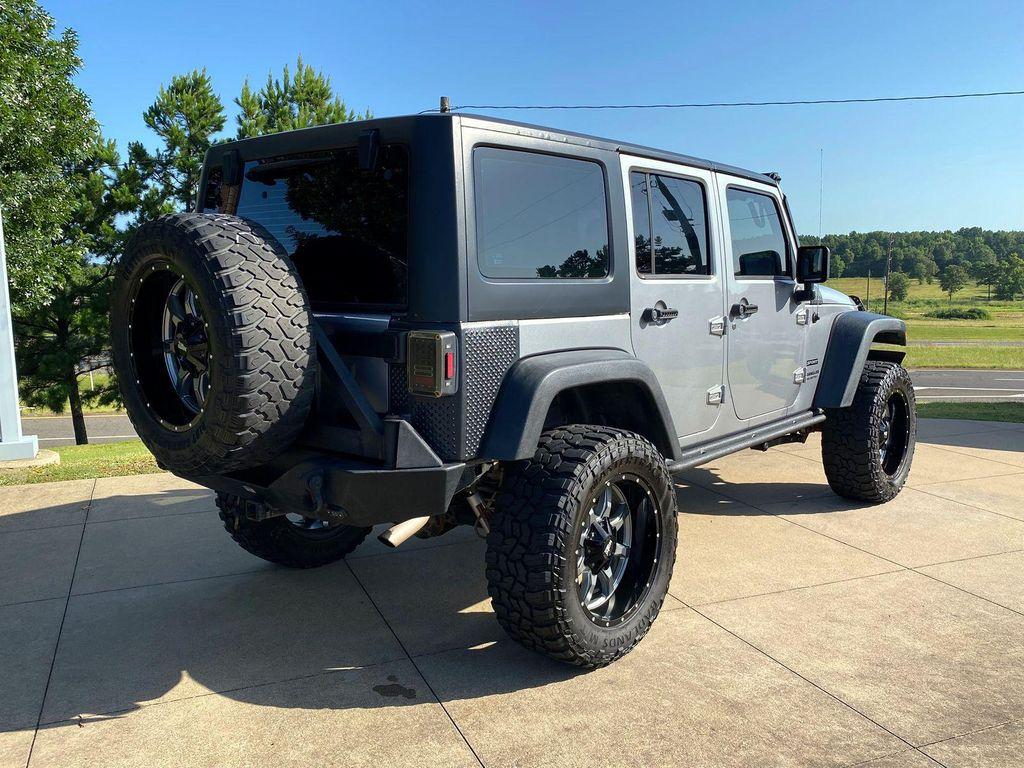 used 2013 Jeep Wrangler Unlimited car, priced at $16,890