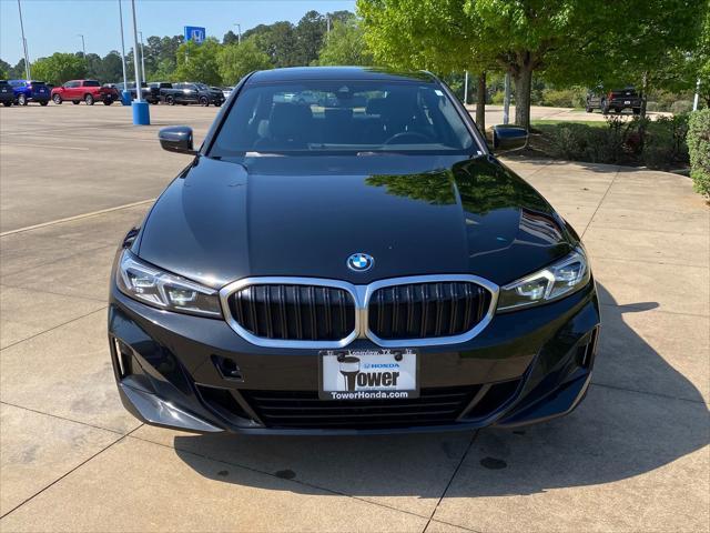 used 2024 BMW 330e car, priced at $34,354
