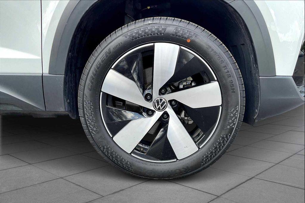 used 2024 Volkswagen Taos car, priced at $20,955