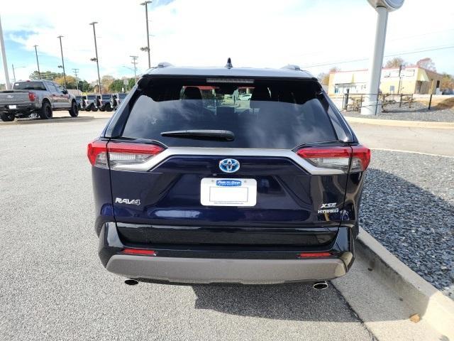 used 2021 Toyota RAV4 Hybrid car, priced at $34,000