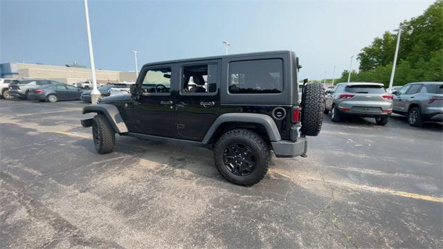 used 2017 Jeep Wrangler Unlimited car, priced at $18,992