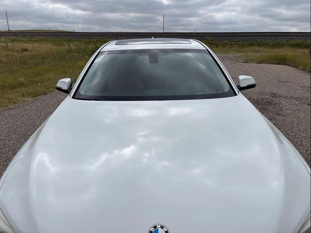 used 2014 BMW 750 car, priced at $15,988