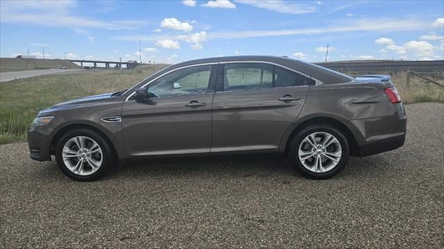 used 2015 Ford Taurus car, priced at $10,000