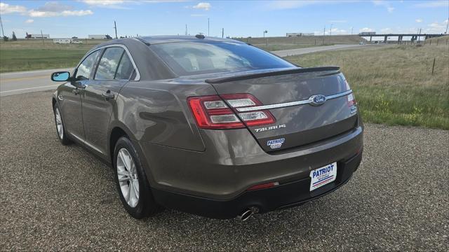 used 2015 Ford Taurus car, priced at $10,000