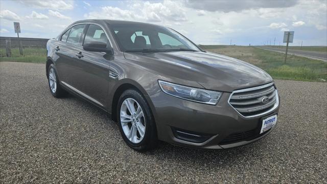 used 2015 Ford Taurus car, priced at $10,000