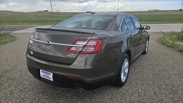 used 2015 Ford Taurus car, priced at $10,000