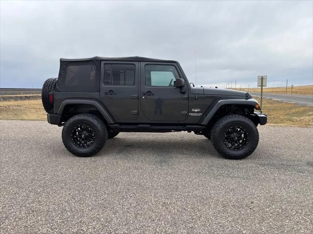 used 2010 Jeep Wrangler Unlimited car, priced at $12,988