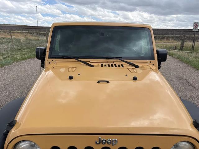 used 2014 Jeep Wrangler Unlimited car, priced at $17,998