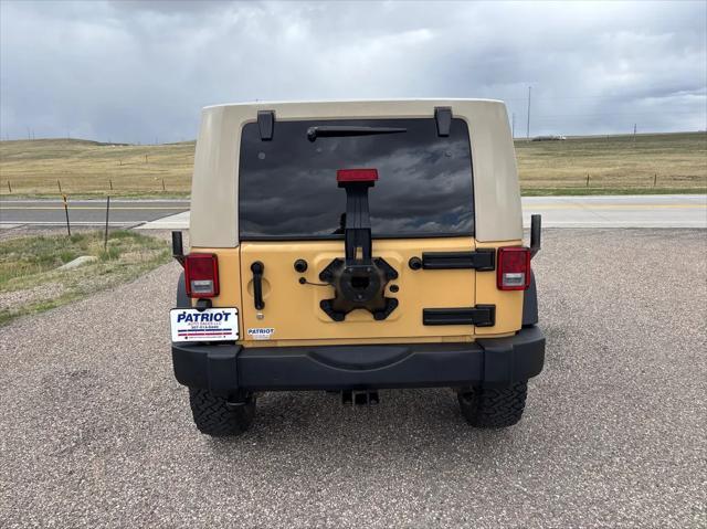 used 2014 Jeep Wrangler Unlimited car, priced at $17,998