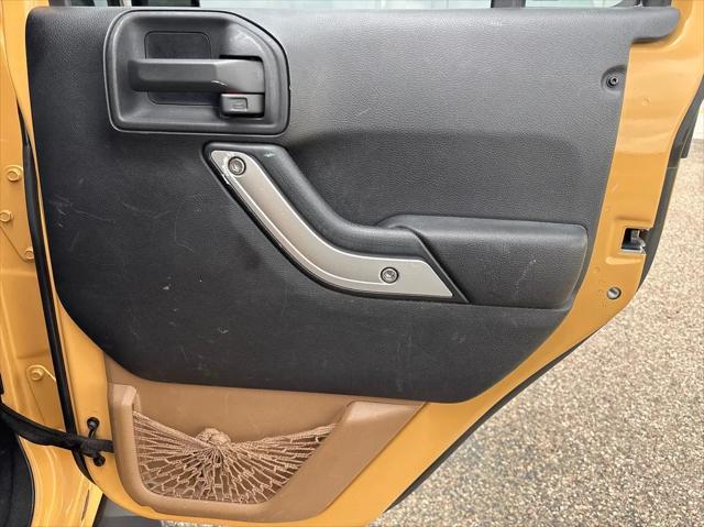 used 2014 Jeep Wrangler Unlimited car, priced at $17,998
