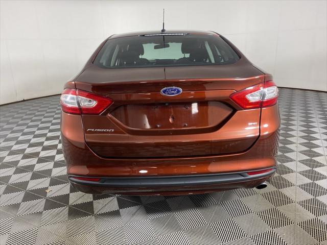 used 2016 Ford Fusion car, priced at $10,999