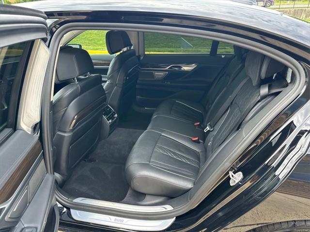 used 2022 BMW 740 car, priced at $25,000