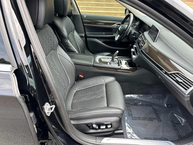 used 2022 BMW 740 car, priced at $25,000