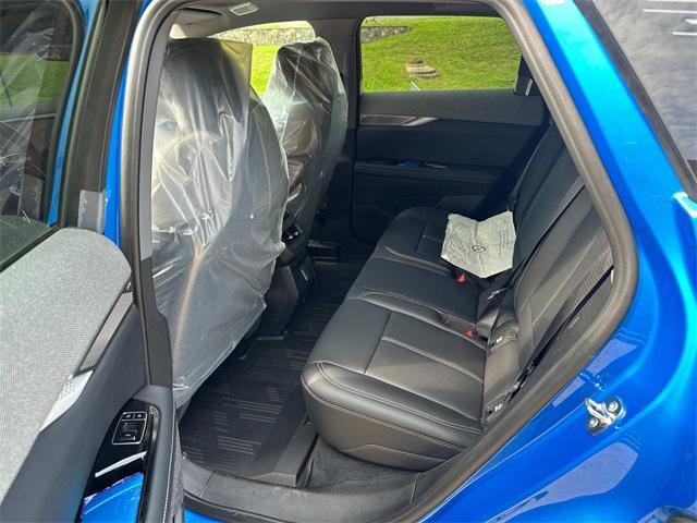 new 2025 Cadillac OPTIQ car, priced at $55,390