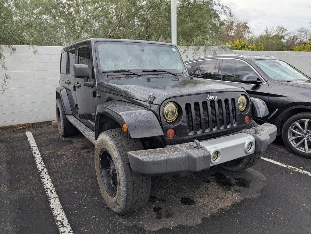 used 2012 Jeep Wrangler Unlimited car, priced at $13,655