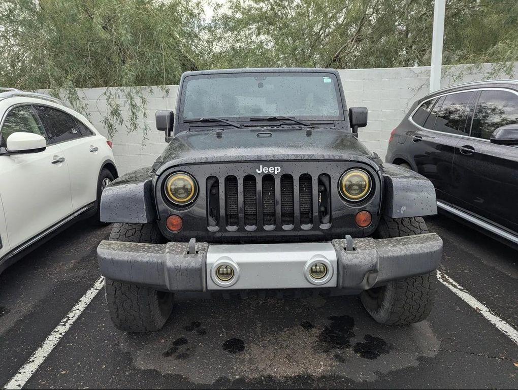used 2012 Jeep Wrangler Unlimited car, priced at $13,655