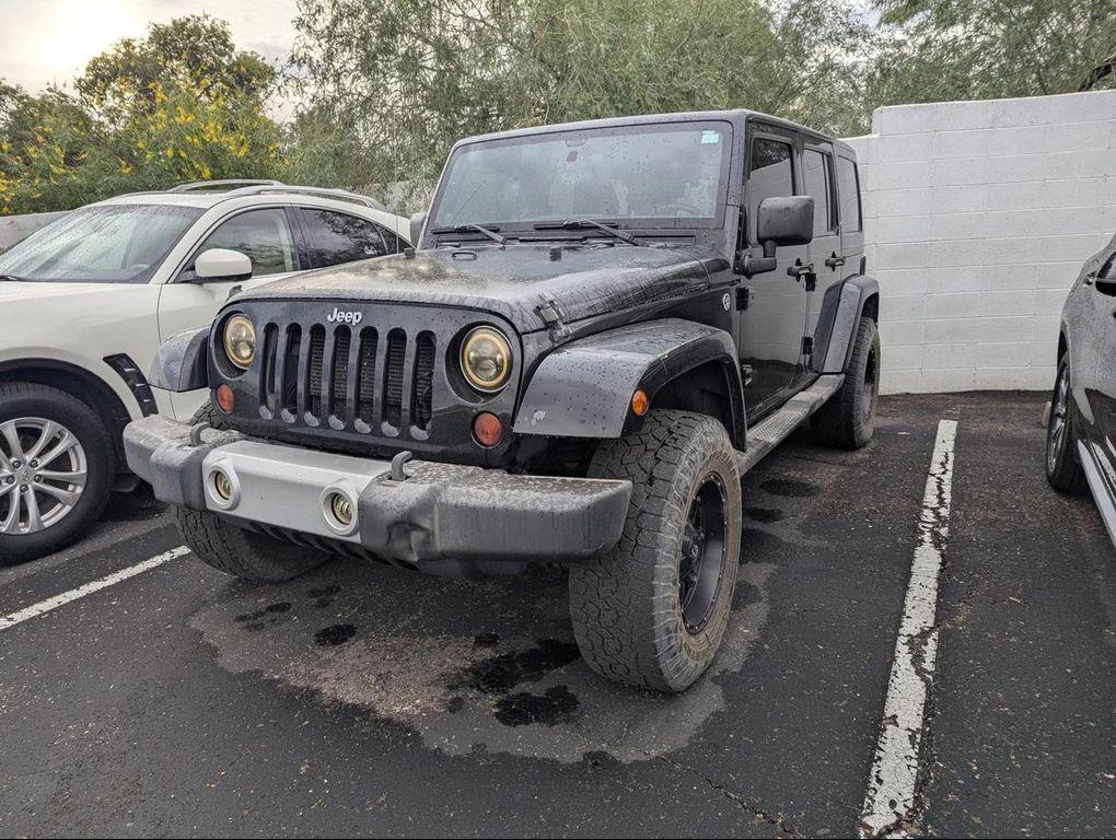 used 2012 Jeep Wrangler Unlimited car, priced at $13,655