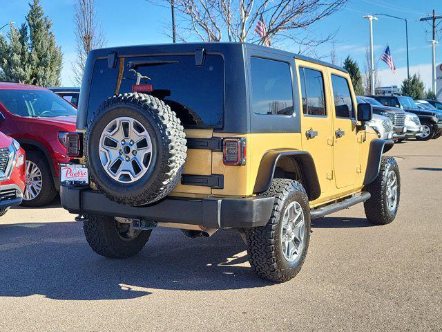 used 2014 Jeep Wrangler Unlimited car, priced at $19,877