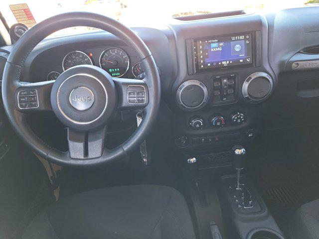 used 2014 Jeep Wrangler Unlimited car, priced at $19,877