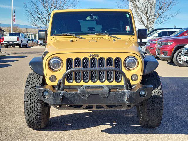 used 2014 Jeep Wrangler Unlimited car, priced at $19,877
