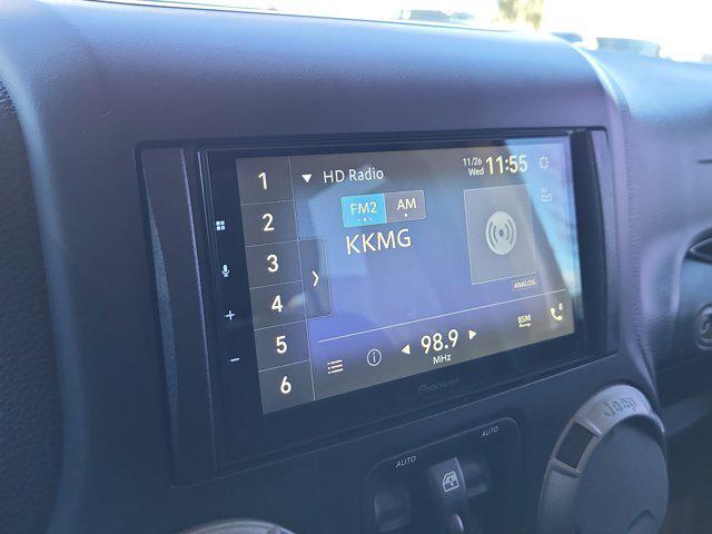 used 2014 Jeep Wrangler Unlimited car, priced at $19,877