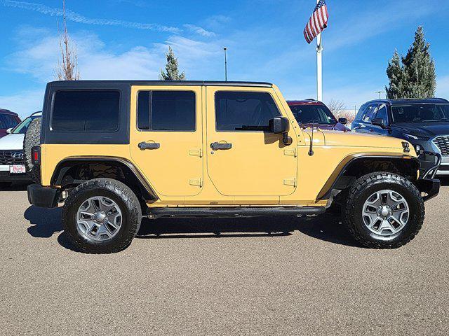 used 2014 Jeep Wrangler Unlimited car, priced at $19,877