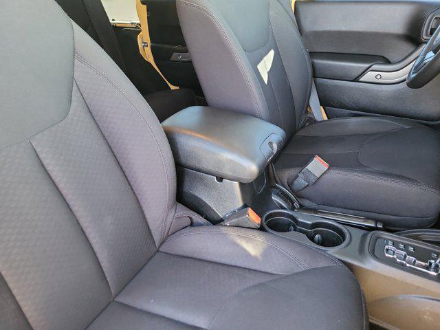 used 2014 Jeep Wrangler Unlimited car, priced at $19,877