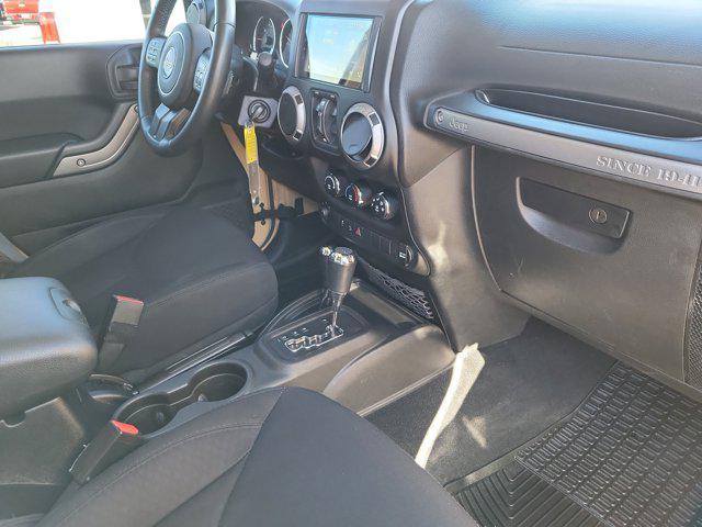 used 2014 Jeep Wrangler Unlimited car, priced at $19,877