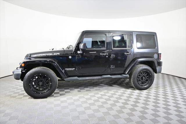 used 2015 Jeep Wrangler Unlimited car, priced at $19,997