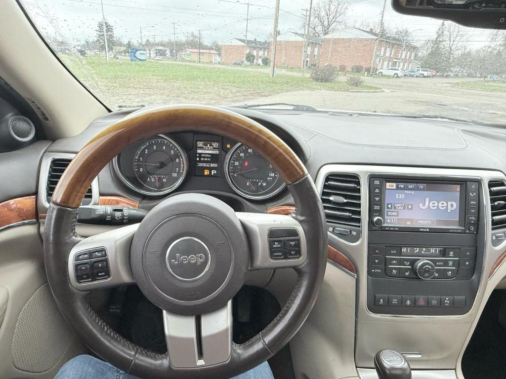 used 2011 Jeep Grand Cherokee car, priced at $9,998