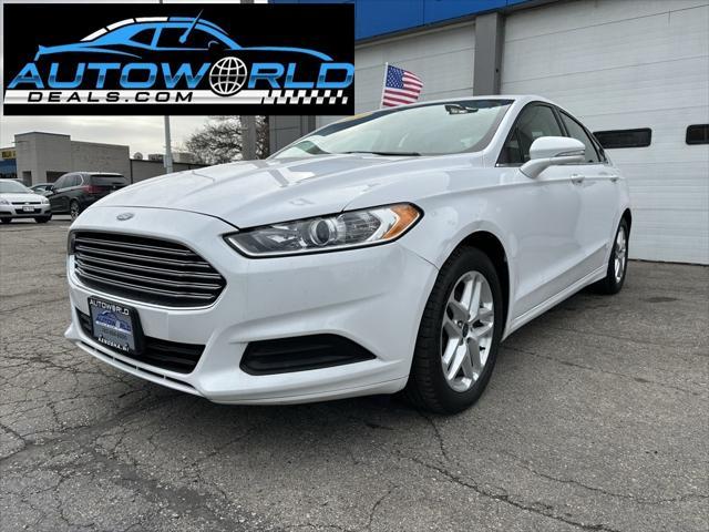 used 2014 Ford Fusion car, priced at $10,604